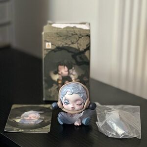 Charming Blue and Gray Figurine